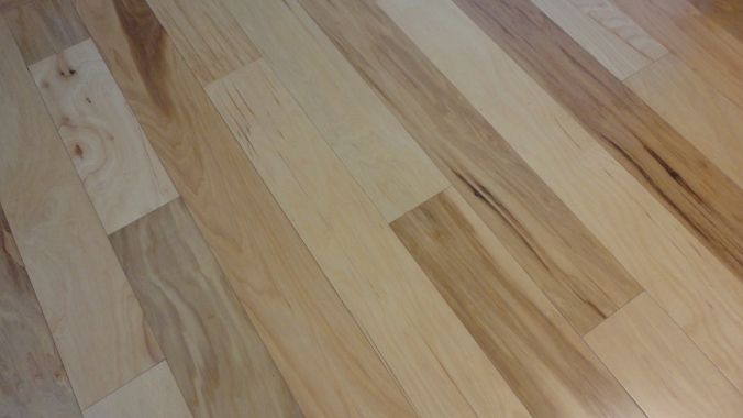 The kitchen flooring was new. It's engineered hickory, and quite nice looking. 